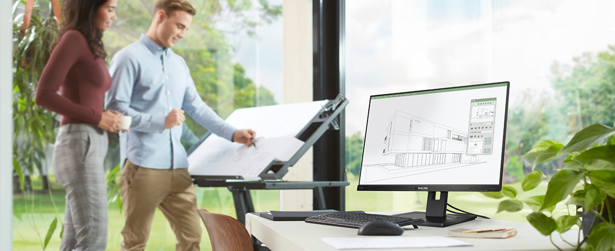 İnsanlar, Philips'in &ccedil;evre dostu, d&uuml;ş&uuml;k etkili monit&ouml;rleriyle iş yerinde keyif alıyor.